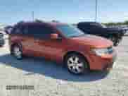 2013 Dodge Journey Crew with VIN 3C4PDDDG0DT661828, listed as a Copart auction lot 71829665 with 154,272 mi miles and Salvage title. Bid and sale history available at DreamBid. Image 4.