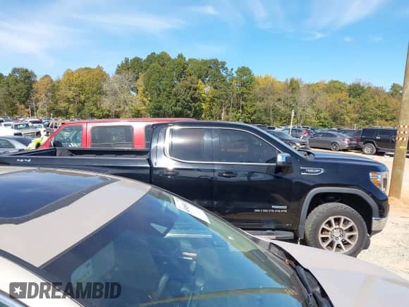 2019 GMC Sierra 1500 SLE with VIN 1GTR9BED5KZ342112, listed as a IAAI auction lot 43531746 with 118,719 mi miles and . Bid and sale history available at DreamBid. Image 13.