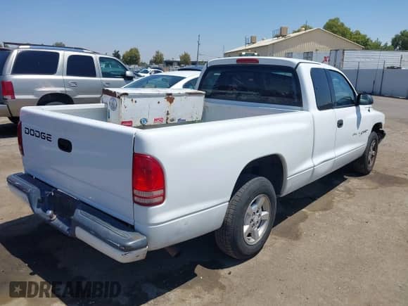 2001 Dodge Dakota with VIN 1B7GL22X91S188051, listed as a IAAI auction lot 40048902 with 304,305 mi miles and . Bid and sale history available at DreamBid. Image 4.