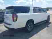 2021 Chevrolet Suburban LT z VIN 1GNSCCKD4MR308637, wystawiony jako IAAI lot #41275312 z przebiegiem 84 833 mil mil oraz . Historia ofert i sprzedaży dostępna na DreamBid. Obrazek 4.