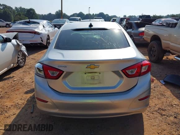 2018 Chevrolet Cruze LS with VIN 1G1BC5SM3J7237273, listed as a IAAI auction lot 42673802 with 103,633 mi miles and . Bid and sale history available at DreamBid. Image 16.