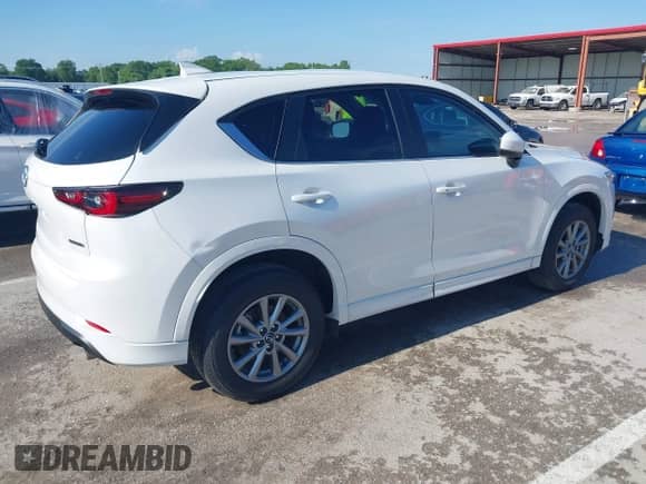 2024 Mazda CX-5 S Preferred z VIN JM3KFBCL3R0520576, wystawiony jako IAAI lot #42364808 z przebiegiem 8 482 mil mil oraz . Historia ofert i sprzedaży dostępna na DreamBid. Obrazek 4.