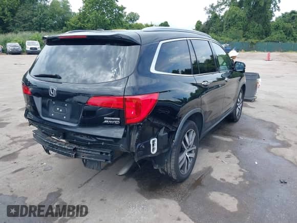 2017 Honda Pilot Touring z VIN 5FNYF6H96HB009726, wystawiony jako IAAI lot #42981867 z przebiegiem 106 056 mil mil oraz . Historia ofert i sprzedaży dostępna na DreamBid. Obrazek 4.