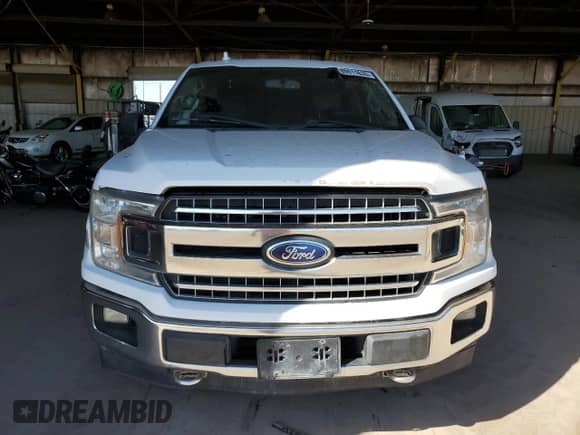 2018 Ford F-150 XLT z VIN 1FTEW1EGXJKE75905, wystawiony jako Copart lot #89911635 z przebiegiem Nie podano mil oraz Szkoda całkowita • Salvage title. Historia ofert i sprzedaży dostępna na DreamBid. Obrazek 5.