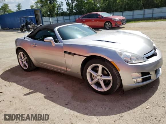 2007 Saturn Sky with VIN 1G8MB35B57Y123144, listed as a Copart auction lot 59415015 with 92,303 mi miles and Salvage title. Bid and sale history available at DreamBid. Image 4.