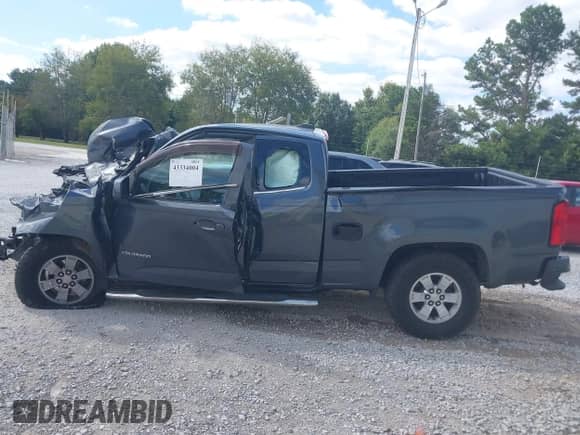2016 Chevrolet Colorado 2WD WT z VIN 1GCHSBEA4G1117658, wystawiony jako IAAI lot #43334004 z przebiegiem Nie podano mil oraz . Historia ofert i sprzedaży dostępna na DreamBid. Obrazek 13.