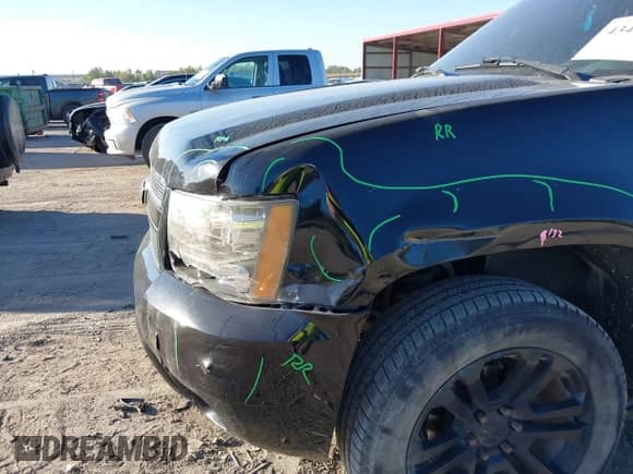 2007 Chevrolet Tahoe LTZ with VIN 1GNFK13027R249676, listed as a IAAI auction lot 43424132 with 296,751 mi miles and . Bid and sale history available at DreamBid. Image 13.