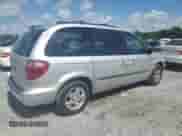 2004 Dodge Caravan SXT with VIN 1D4GP45R64B569005, listed as a Copart auction lot 64564485 with 118,809 mi miles and Salvage title. Bid and sale history available at DreamBid. Image 3.
