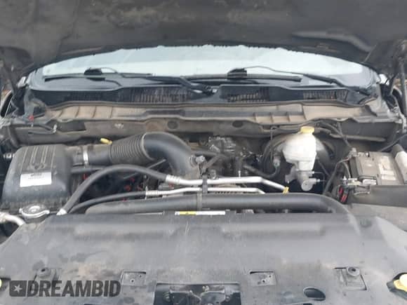 2013 Ram 1500 Outdoorsman z VIN 1C6RR6LT3DS581405, wystawiony jako IAAI lot #42484530 z przebiegiem Nie podano mil oraz . Historia ofert i sprzedaży dostępna na DreamBid. Obrazek 10.