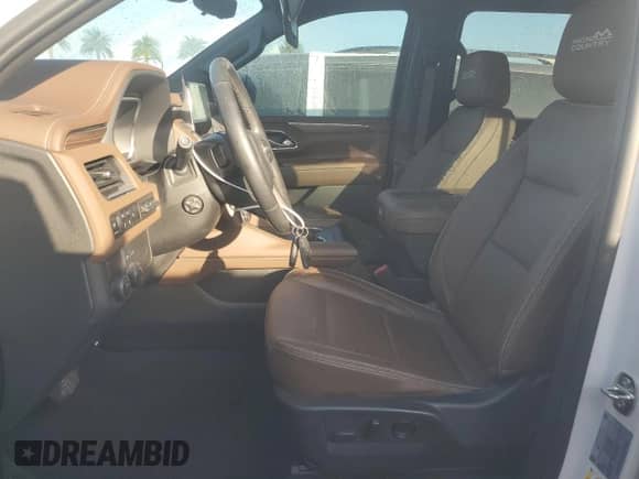 2023 Chevrolet Suburban High Country с VIN 1GNSCGKL8PR171527, выставлен на аукционе Copart как лот 76249274 с пробегом Не указан миль и Списание • Salvage title. История ставок и продаж доступна на DreamBid. Изображение 7.