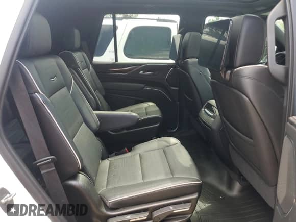 2021 Cadillac Escalade Premium Luxury с VIN 1GYS4CKL3MR260362, выставлен на аукционе Copart как лот 57363655 с пробегом 75 177 миль миль и Списание • Salvage title. История ставок и продаж доступна на DreamBid. Изображение 11.