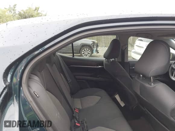 2021 Toyota Camry LE with VIN 4T1C11AK8MU548158, listed as a IAAI auction lot 43333222 with 34,824 mi miles and . Bid and sale history available at DreamBid. Image 8.