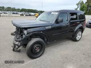 2011 Dodge Nitro Heat with VIN 1D4PT4GK0BW606180, listed as a Copart auction lot 71903985 with 135,991 mi miles and Salvage title. Bid and sale history available at DreamBid. Image 1.