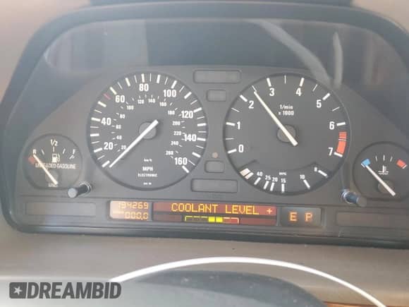 1994 BMW 7 Series with VIN WBAGD8322RDE92891, listed as a Copart auction lot 82638705 with 194,269 mi miles and Clean title. Bid and sale history available at DreamBid. Image 9.