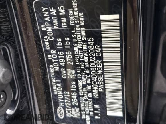 2013 Hyundai Genesis 3.8L z VIN KMHGC4DD6DU220845, wystawiony jako Copart lot #71962964 z przebiegiem 106 762 mil mil oraz Szkoda całkowita • Salvage title. Historia ofert i sprzedaży dostępna na DreamBid. Obrazek 14.