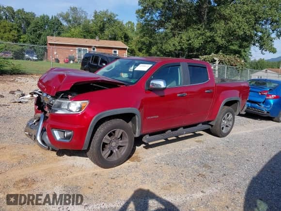 2015 Chevrolet Colorado 4WD LT z VIN 1GCGTBE31F1184744, wystawiony jako IAAI lot #42988122 z przebiegiem 122 987 mil mil oraz . Historia ofert i sprzedaży dostępna na DreamBid. Obrazek 2.