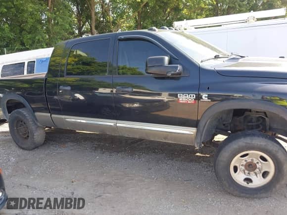 2009 Dodge 2500 SLT with VIN 3D7KS29L59G523881, listed as a IAAI auction lot 42616213 with 232,278 mi miles and . Bid and sale history available at DreamBid. Image 13.