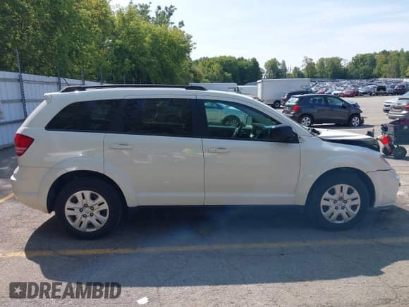 2016 Dodge Journey SE with VIN 3C4PDCAB2GT103518, listed as a IAAI auction lot 43172662 with 149,798 mi miles and . Bid and sale history available at DreamBid. Image 14.