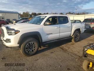 2022 Toyota Tacoma SR с VIN 3TYCZ5AN7NT062174, выставлен на аукционе Copart как лот 87050965 с пробегом 39 385 миль миль и Списание • Salvage title. История ставок и продаж доступна на DreamBid. Изображение 1.