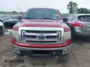 2013 Ford F-150 Lariat with VIN 1FTFW1ET0DKG07088, listed as a IAAI auction lot 42671190 with 202,968 mi miles and . Bid and sale history available at DreamBid. Image 12.