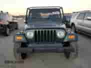 2005 Jeep Wrangler SE z VIN 1J4FA29155P363501, wystawiony jako Copart lot #80388314 z przebiegiem 97 564 mil mil oraz Czysty tytuł • Clean title. Historia ofert i sprzedaży dostępna na DreamBid. Obrazek 5.