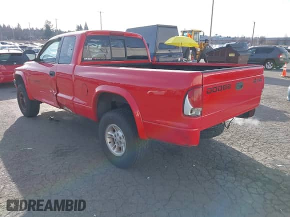 1999 Dodge Dakota SLT with VIN 1B7GG22XXXS290116, listed as a IAAI auction lot 41372636 with 132,112 mi miles and . Bid and sale history available at DreamBid. Image 3.