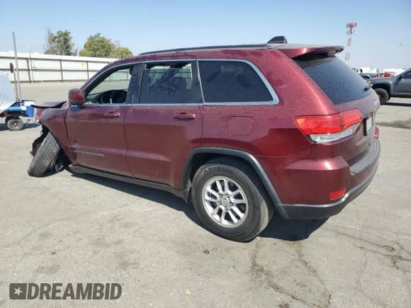 2018 Jeep Grand Cherokee Altitude with VIN 1C4RJEAGXJC513169, listed as a Copart auction lot 71512345 with 70,013 mi miles and Salvage title. Bid and sale history available at DreamBid. Image 2.
