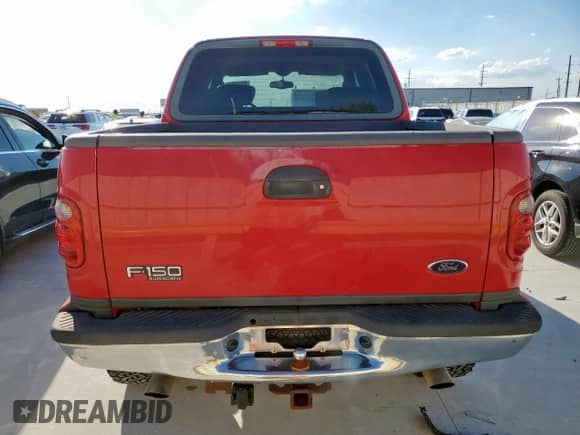 2003 Ford F-150 XLT z VIN 1FTRW08L43KD41950, wystawiony jako Copart lot #85650865 z przebiegiem 159 580 mil mil oraz Czysty tytuł • Clean title. Historia ofert i sprzedaży dostępna na DreamBid. Obrazek 6.