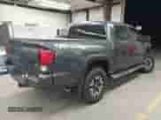 2019 Toyota Tacoma TRD Off Road with VIN 3TMCZ5AN2KM194198, listed as a IAAI auction lot 43463635 with 48,375 mi miles and . Bid and sale history available at DreamBid. Image 4.