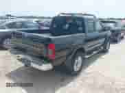 2001 Nissan Frontier SE with VIN 1N6ED27T81C305653, listed as a IAAI auction lot 42260643 with 245,547 mi miles and . Bid and sale history available at DreamBid. Image 4.