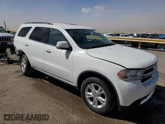 2012 Dodge Durango Crew with VIN 1C4SDJDT3CC329883, listed as a Copart auction lot 49286875 with 87,948 mi miles and Salvage title. Bid and sale history available at DreamBid. Image 4.