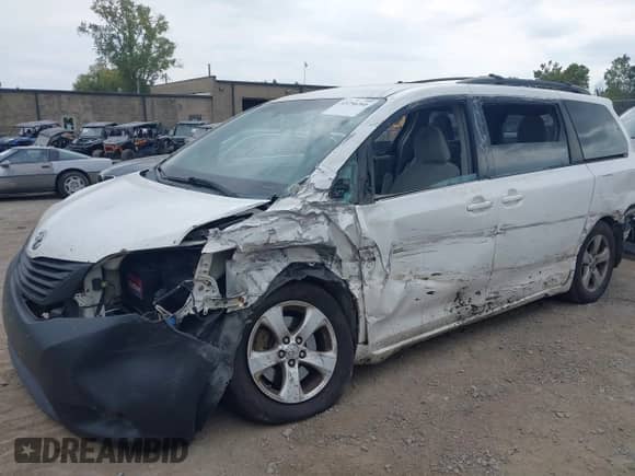 2012 Toyota Sienna LE AAS with VIN 5TDKK3DC0CS261672, listed as a IAAI auction lot 43256260 with 477,784 mi miles and . Bid and sale history available at DreamBid. Image 6.