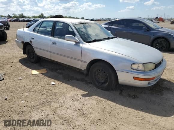 1994 Toyota Camry LE z VIN JT2SK12E7R0212501, wystawiony jako Copart lot #70767655 z przebiegiem 264 521 mil mil oraz Szkoda całkowita • Salvage title. Historia ofert i sprzedaży dostępna na DreamBid. Obrazek 4.