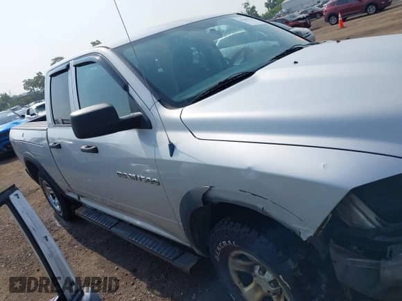 2012 Ram 1500 ST z VIN 1C6RD7FPXCS314926, wystawiony jako IAAI lot #42485348 z przebiegiem 77 663 mil mil oraz . Historia ofert i sprzedaży dostępna na DreamBid. Obrazek 13.