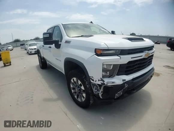 2024 Chevrolet Silverado 2500HD Custom z VIN 2GC4YME72R1121850, wystawiony jako Copart lot #66163225 z przebiegiem 57 752 mil mil oraz Szkoda całkowita • Salvage title. Historia ofert i sprzedaży dostępna na DreamBid. Obrazek 13.