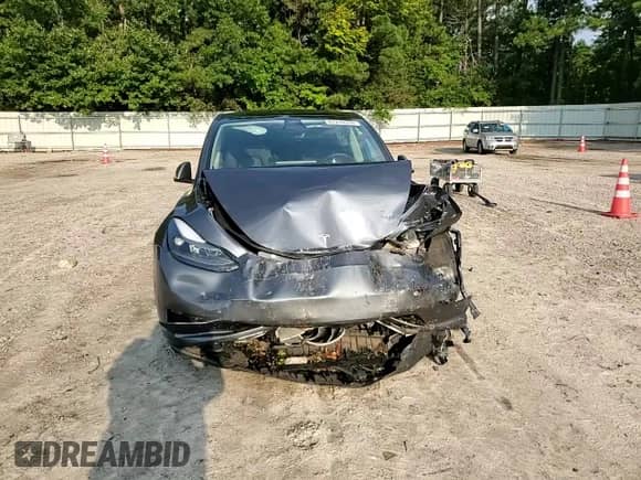 2023 Tesla Model Y Long Range with VIN 7SAYGAEE4PF668889, listed as a Copart auction lot 67239314 with 26,874 mi miles and Salvage title. Bid and sale history available at DreamBid. Image 11.