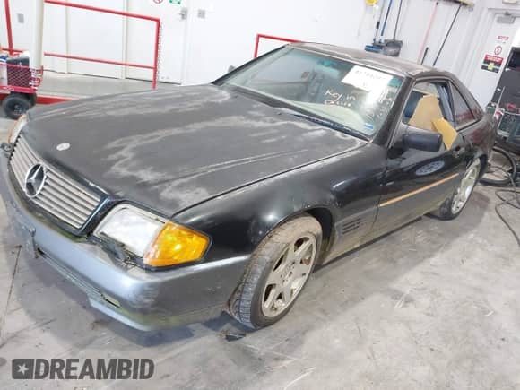1992 Mercedes-Benz 500 z VIN WDBFA66E7NF043220, wystawiony jako IAAI lot #42744207 z przebiegiem Nie podano mil oraz . Historia ofert i sprzedaży dostępna na DreamBid. Obrazek 2.