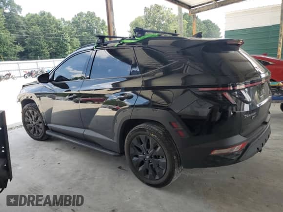 2023 Hyundai Tucson XRT with VIN KM8JFCAE0PU219909, listed as a Copart auction lot 62232115 with 50,187 mi miles and Salvage title. Bid and sale history available at DreamBid. Image 2.