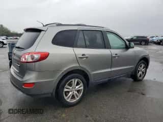 2012 Hyundai Santa Fe SE с VIN 5XYZH4AG3CG132283, выставлен на аукционе Copart как лот 82375095 с пробегом 195 340 миль миль и Списание • Salvage title. История ставок и продаж доступна на DreamBid. Изображение 3.