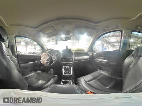 2016 Jeep Compass Latitude with VIN 1C4NJDEBXGD721806, listed as a Copart auction lot 86772214 with 137,065 mi miles and Salvage title. Bid and sale history available at DreamBid. Image 15.
