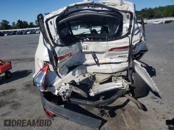 2020 Honda Pilot EX-L z VIN 5FNYF6H57LB027108, wystawiony jako Copart lot #70009905 z przebiegiem Nie podano mil oraz Szkoda całkowita • Salvage title. Historia ofert i sprzedaży dostępna na DreamBid. Obrazek 6.