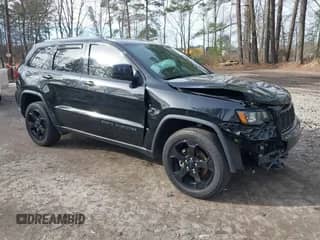 2018 Jeep Grand Cherokee Laredo E with VIN 1C4RJFAG1JC426542, listed as a IAAI auction lot 41729268 with 106,024 mi miles and . Bid and sale history available at DreamBid. Image 1.