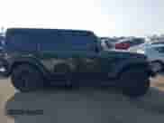 2022 Jeep Wrangler Unlimited High Tide z VIN 1C4HJXDG5NW113205, wystawiony jako IAAI lot #41488724 z przebiegiem 30 446 mil mil oraz . Historia ofert i sprzedaży dostępna na DreamBid. Obrazek 14.