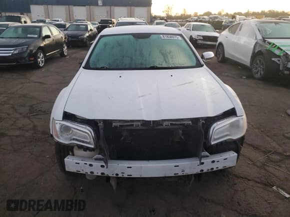 2014 Chrysler 300 C z VIN 2C3CCAKT7EH100959, wystawiony jako Copart lot #81858975 z przebiegiem 154 028 mil mil oraz Szkoda całkowita • Salvage title. Historia ofert i sprzedaży dostępna na DreamBid. Obrazek 5.