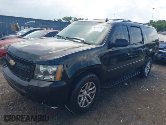 2007 Chevrolet Suburban LS with VIN 1GNFC16J97R335570, listed as a IAAI auction lot 42727238 with 360,308 mi miles and . Bid and sale history available at DreamBid. Image 6.