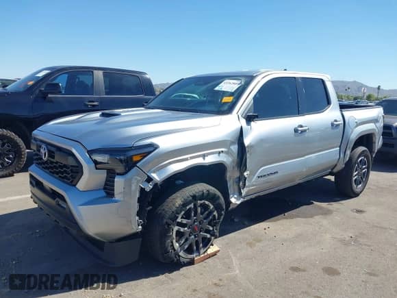 2024 Toyota Tacoma SR5 with VIN 3TMKB5FN2RM001972, listed as a IAAI auction lot 43362889 with 21,644 mi miles and . Bid and sale history available at DreamBid. Image 6.