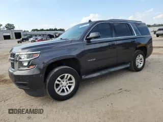 2015 Chevrolet Tahoe LT with VIN 1GNSKBKC0FR145282, listed as a Copart auction lot 80811165 with 288,771 mi miles and Salvage title. Bid and sale history available at DreamBid. Image 1.
