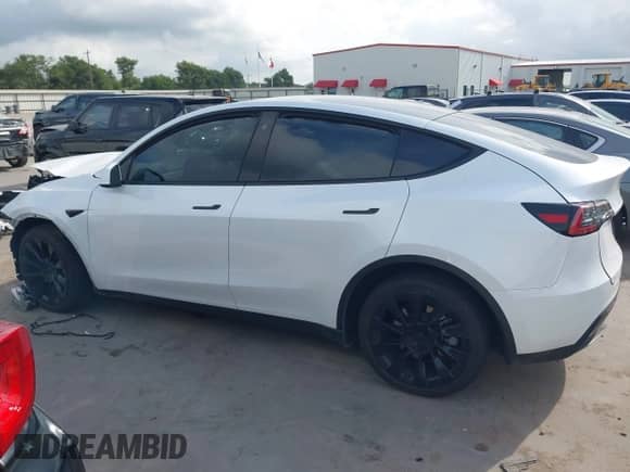 2023 Tesla Model Y Long Range с VIN 7SAYGDEE2PA071402, выставлен на аукционе IAAI как лот 42729170 с пробегом 31 865 миль миль и . История ставок и продаж доступна на DreamBid. Изображение 15.