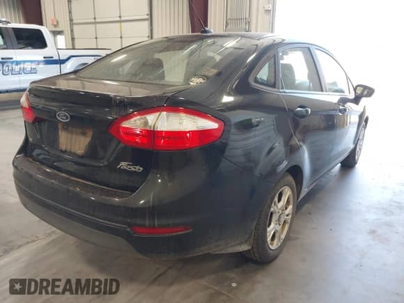 2015 Ford Fiesta SE with VIN 3FADP4BJXFM198561, listed as a IAAI auction lot 43343716 with 110,064 mi miles and . Bid and sale history available at DreamBid. Image 4.