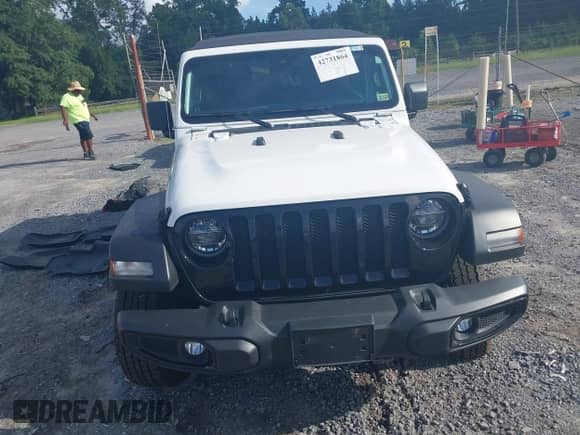 2021 Jeep Wrangler Unlimited Willys with VIN 1C4HJXDM8MW577187, listed as a IAAI auction lot 42731864 with 71,256 mi miles and . Bid and sale history available at DreamBid. Image 13.